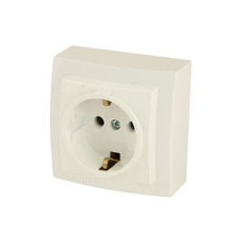 Розетка с заземлением открытой проводки цвет Бежевый NILSON